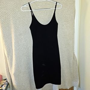 Black form-fitting stretchy seaghetti strap dress